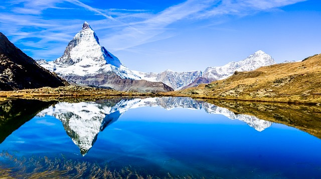 Luxury travel through Switzerland - Matterhorn with mountain lake